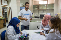 Addullah Nimje (Cap Anamur nurse) talking to nurses at the health station (Imam Ali Clinic) in Sidon.